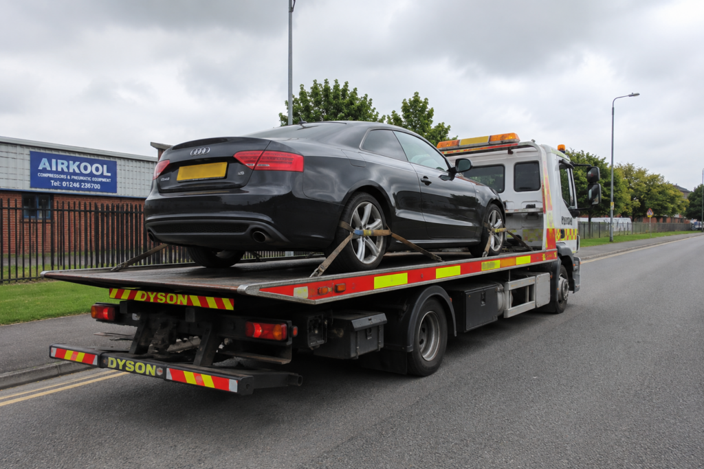 A man performing flatbed towing in chesterfield